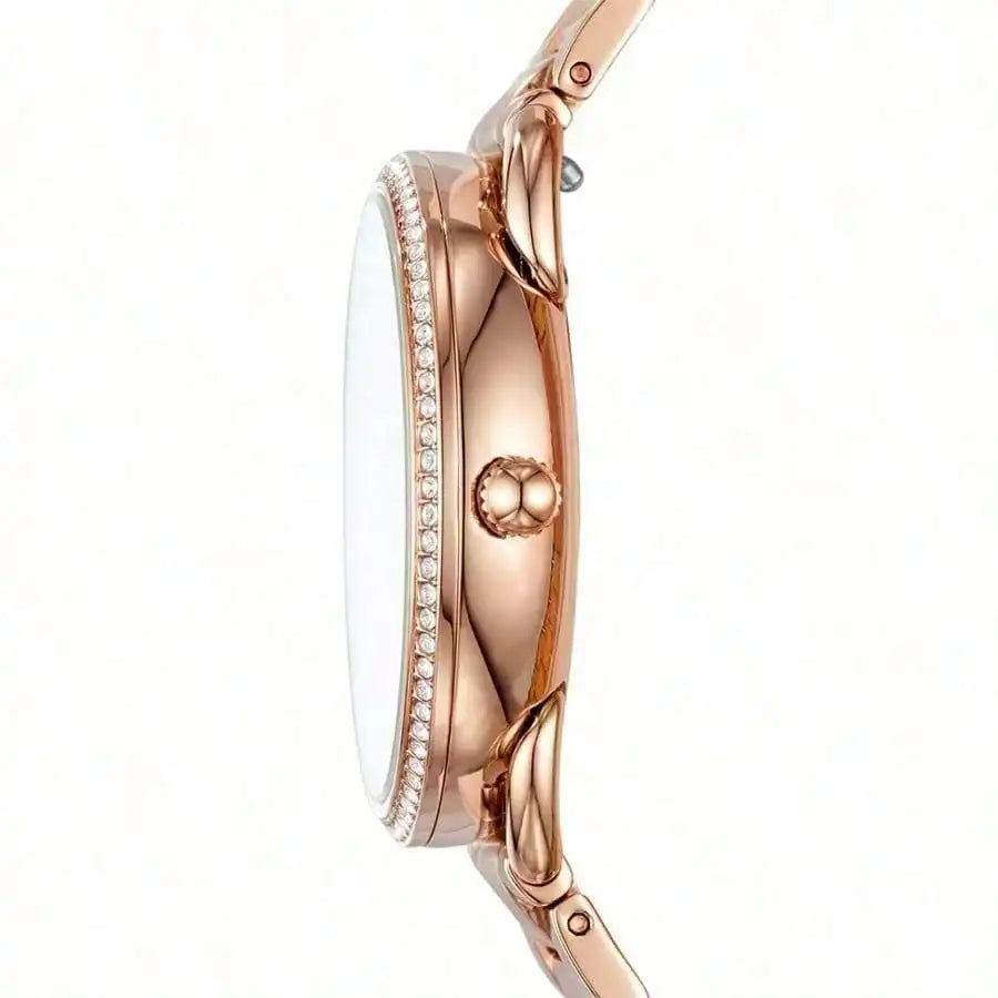 vastara - fossil women's round quartz watch - stainless steel three pointer watch detail - quartz movement movement,